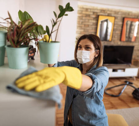 h6 Woman working at home, cleaning the floors, washing the laundry and cleaning up the mess in the closet during quarantine