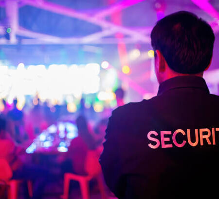 s14 Security guard are regulating the situation of safety in an event concert in a nightclub.